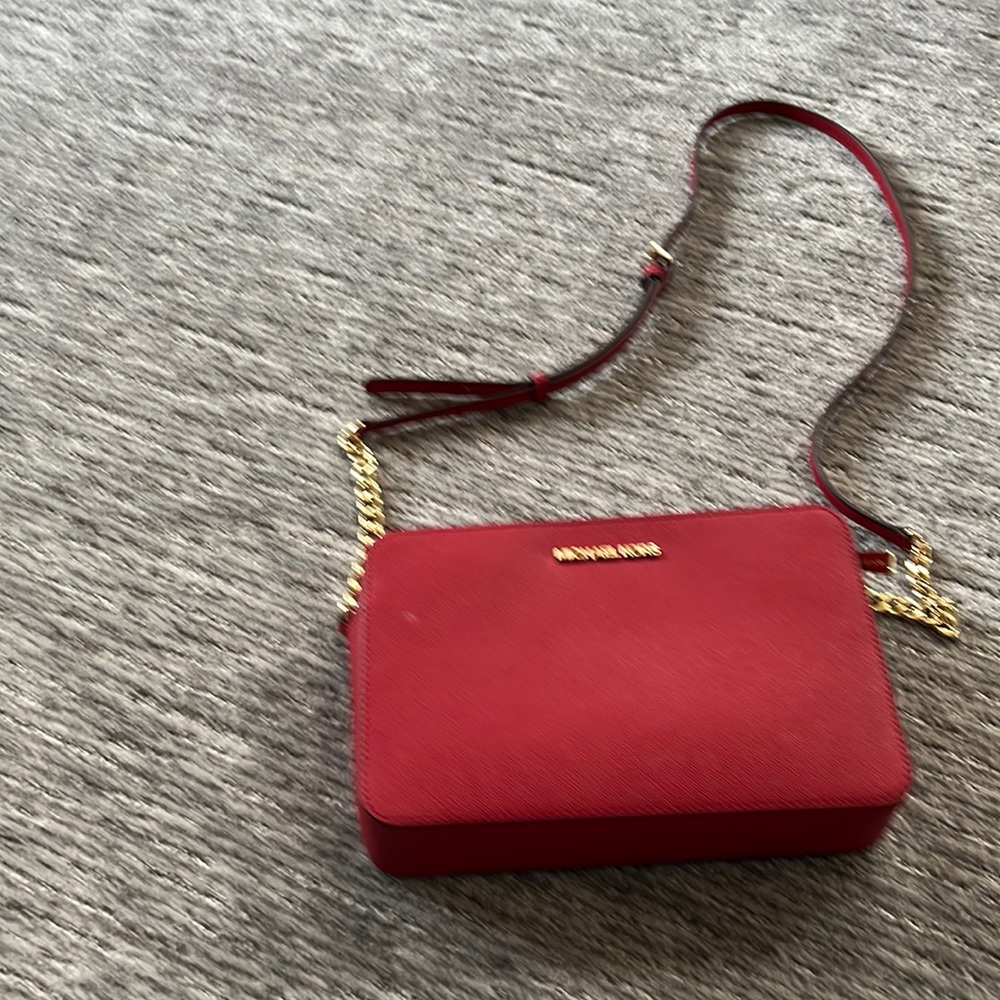 Small red evening purse with gold chain